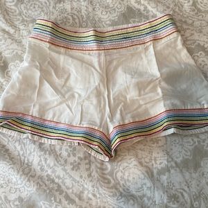 Solid and Striped. White beach shorts with rainbow trim. XS